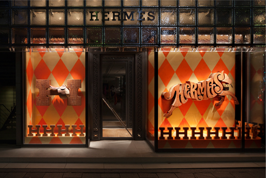 Lettering wizards of House Industries turn the Maison Hermès Tokyo  storefront into a carousel