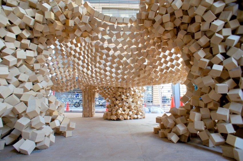 7000 wooden cubes linked together in an inverted question-cube